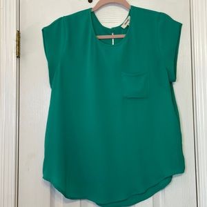Fabulous green top with keyhole button back and front breast pocket